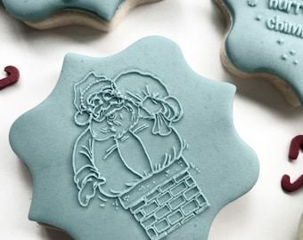 Santa coming down the chimneyfireplace Cookie or Fondant Cutter with built-in imprint