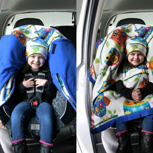 Car Seat Poncho Owl Cozy Gozy Travel Capes are warm winter fleece car seat capes that are a safe alternative to heavy coats in car seats. image 2