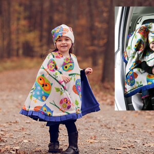 Car Seat Poncho Owl Cozy Gozy Travel Capes are warm winter fleece car seat capes that are a safe alternative to heavy coats in car seats. image 1