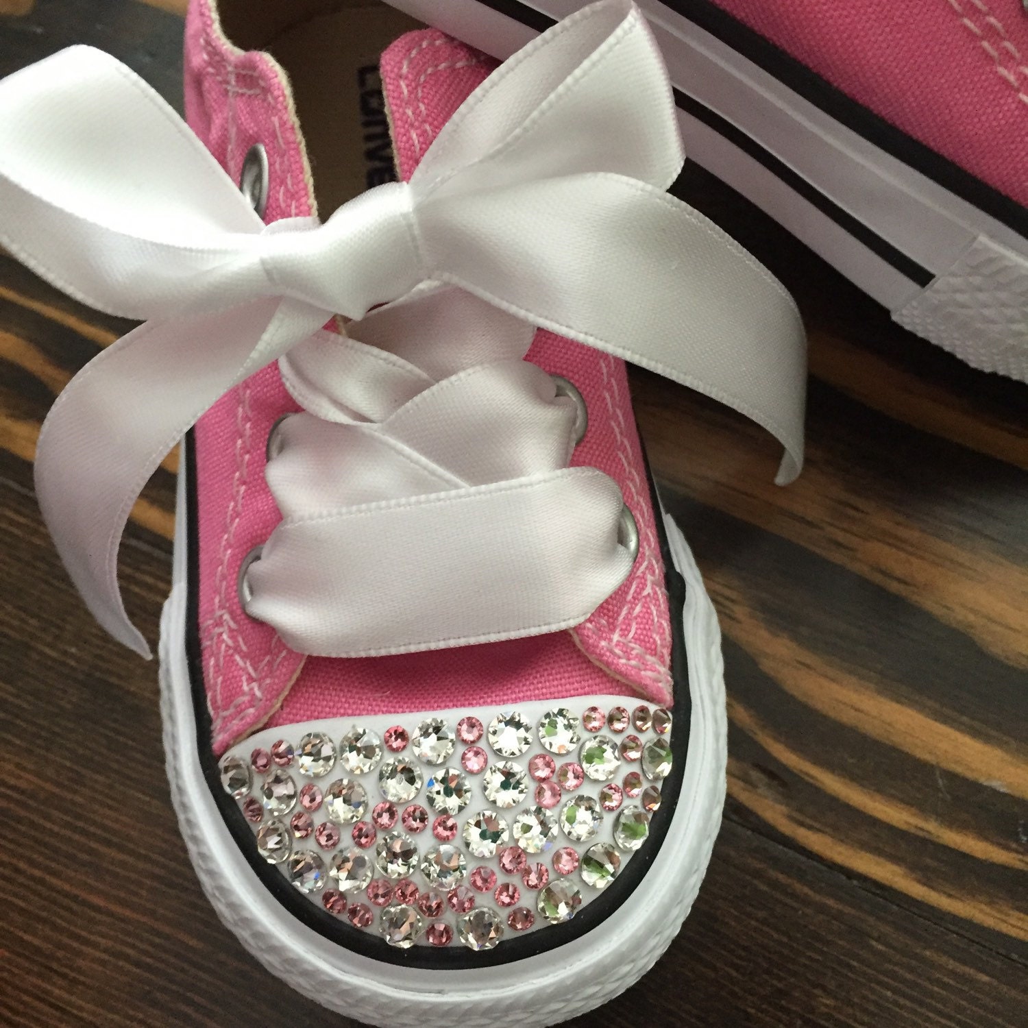 silver converse with pink bow