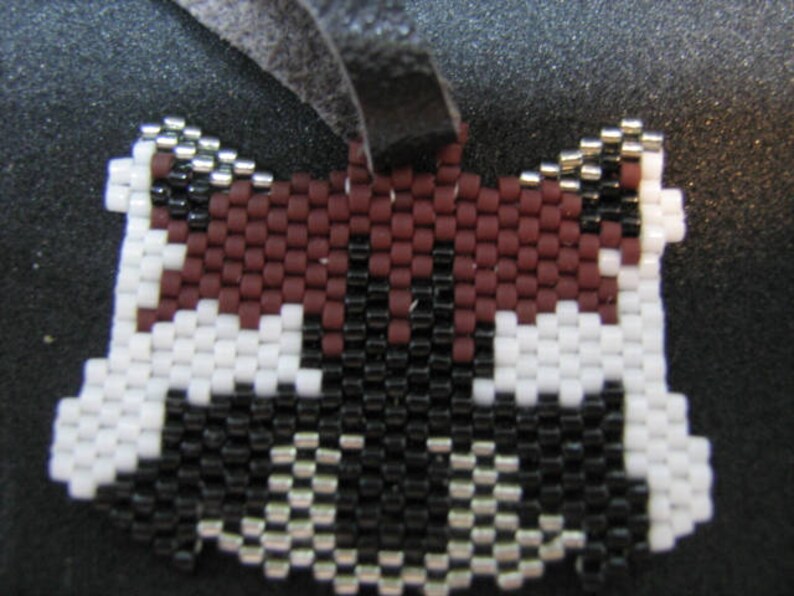 raccon wrist charm