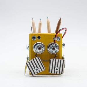 Handmade red robot shaped pen holder
