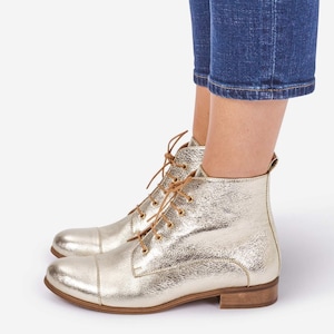 Gold flat boots for carnival deals