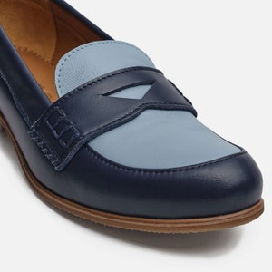 Navy loafers with contrasting blue vamp