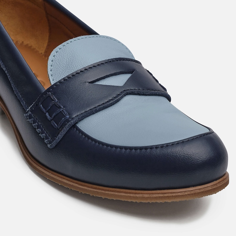 Navy loafers with contrasting blue vamp