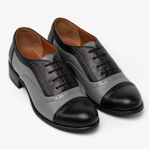 Ladies black wingtip brogues