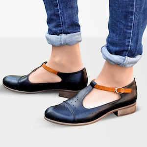 Ladies t-bar black shoes