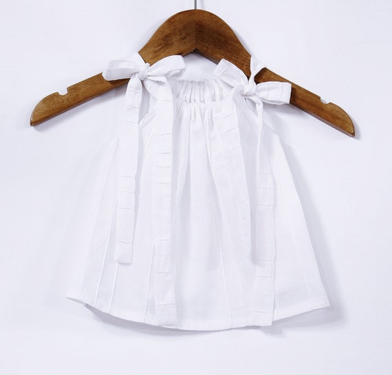 white cotton baby dress