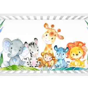 May include: A white crib sheet with a watercolor design of a giraffe, elephant, zebra, rhino, and lion. The animals are all smiling and have bright colors. The sheet has a green and blue leafy border.