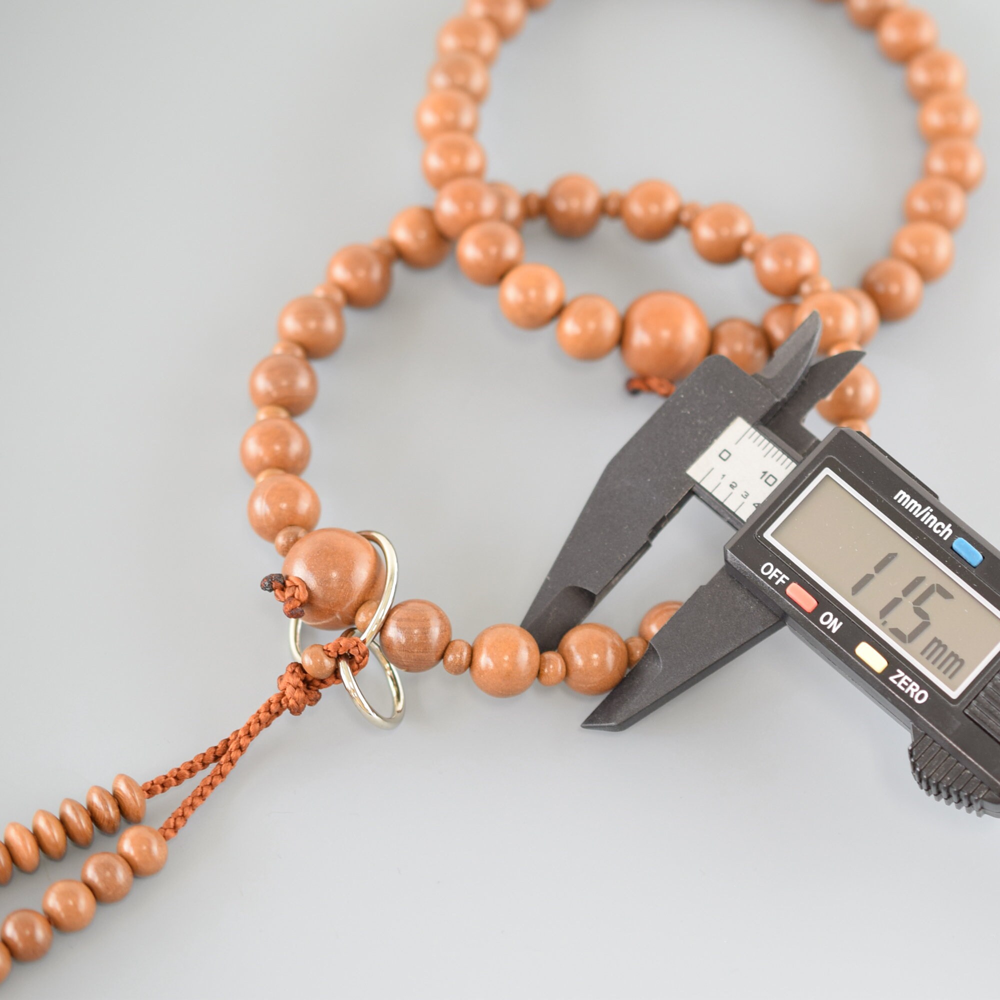 Zen Cedar 108 Bead Mala with Characters Zen Cedar 108 Bead Mala with Characters