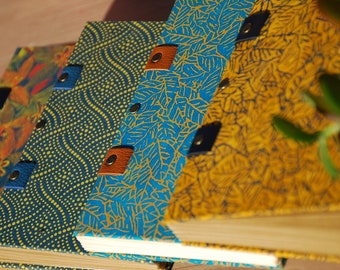 Jungle style travel diary, this handmade notebook is composed of 108 pages of 120g kraft paper, Coptic binding, choice of cover paper