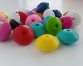 CLEARANCE Pearl flattened round silicone 12 * 7 mm in packs of 20