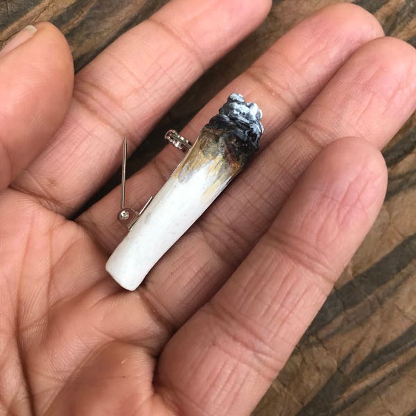 Marijuana weed joint cigarette roach cannabis pot head stoner gift 420 smoking burning ashes ganja spliff sativa indica