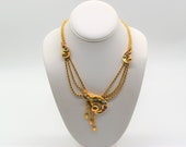 Spectacular hand made 21k, 47.6g,  intricate multi flower 18inch necklace.