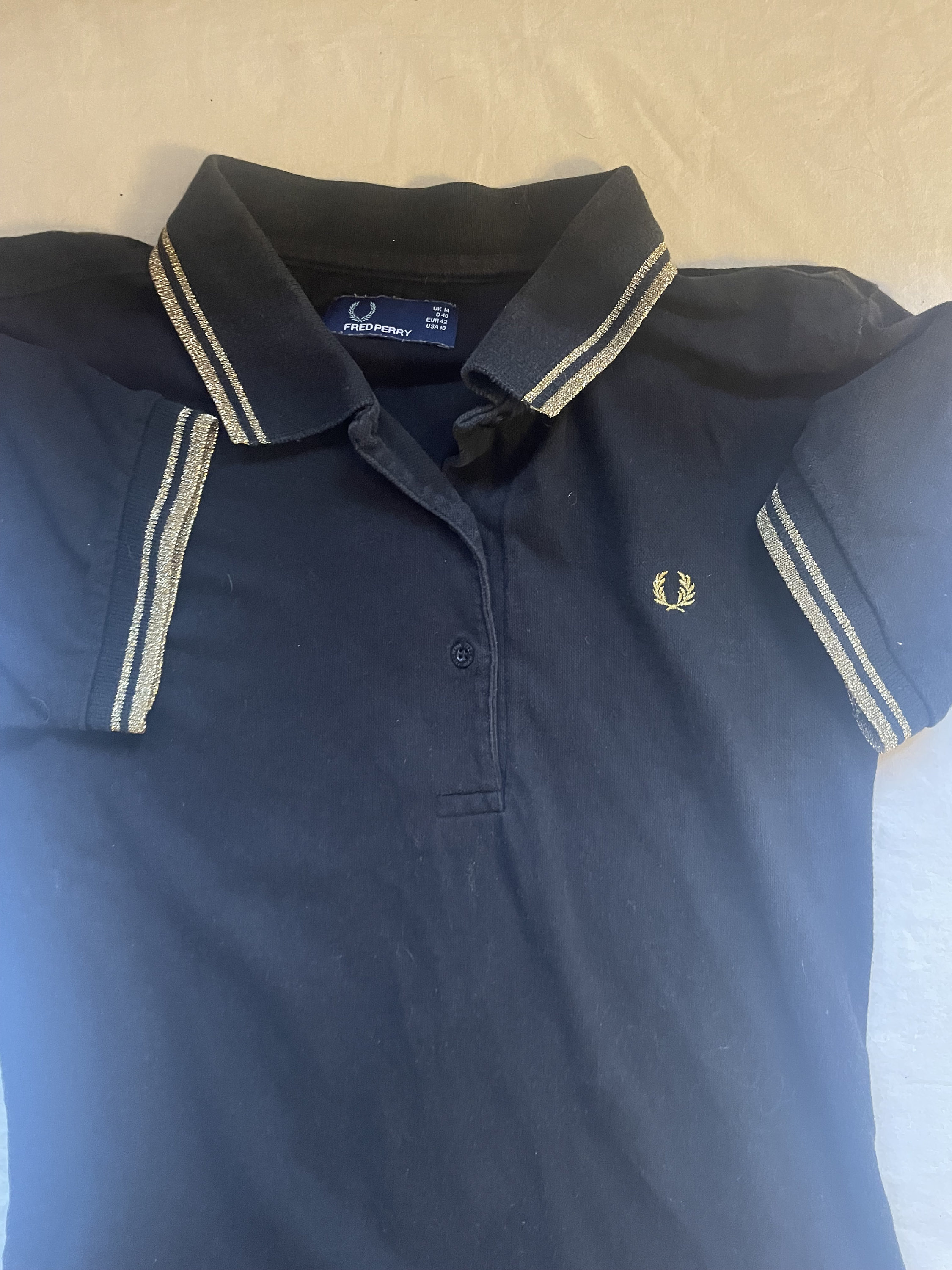 Black and gold top fred perry shirt