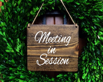 in a meeting sign etsy