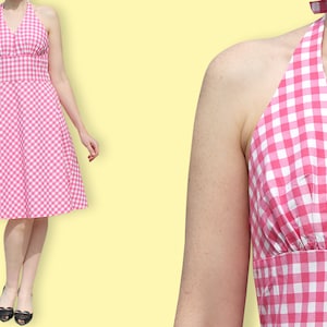 May include: A pink and white gingham halter dress with a fitted bodice and a full skirt.