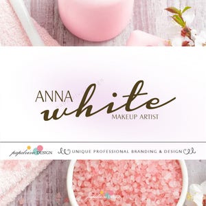 May include: A logo for a makeup artist named Anna White. The logo is in a cursive font and the words "Makeup Artist" are below the name.