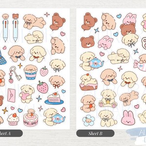 Peut inclure: Deux planches d'autocollants pr&eacute;sentant diverses illustrations de chiots cr&egrave;me, d'ours bruns et de lapins roses. Les motifs incluent de petits objets comme une r&egrave;gle, des stylos, un t&eacute;l&eacute;phone &agrave; clapet, des cl&eacute;s, des fraises, des g&acirc;teaux et des c&oelig;urs.