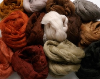 May include: A collection of 12 different colored wool rovings, including brown, beige, white, gray, black, and orange.