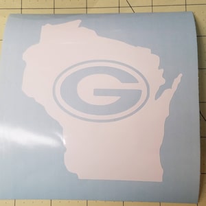 May include: White vinyl decal of the state of Wisconsin with a green and white "G" inside a circle in the center.