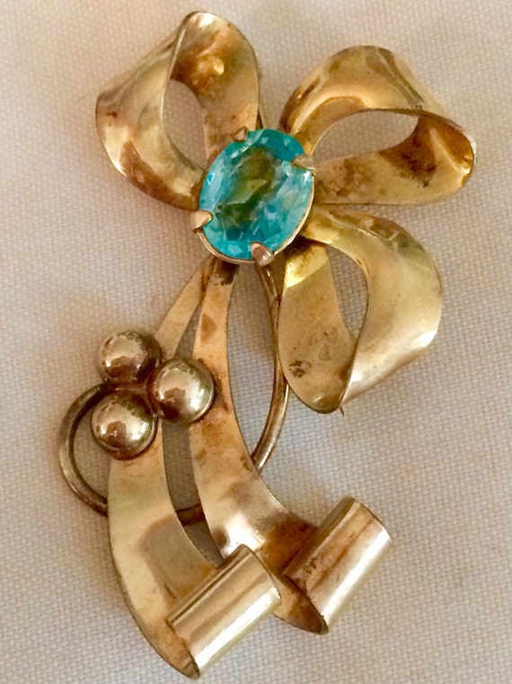 Vintage Carl Art gold bow brooch with large aqua … - image 1