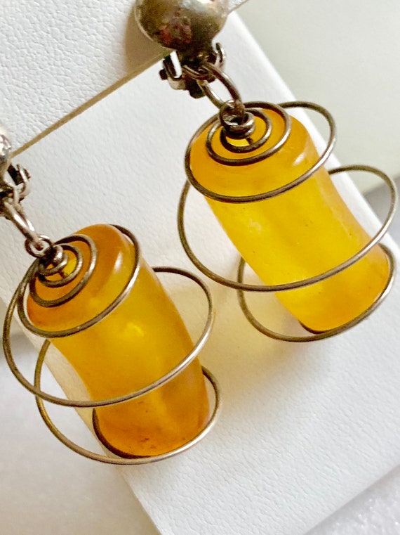Vintage lucite amber earrings caged with steel sp… - image 1