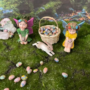 Miniature fairy garden bunny stretched out and relaxing peacefully in the grass fairy garden accessory gnome garden terrarium bunny