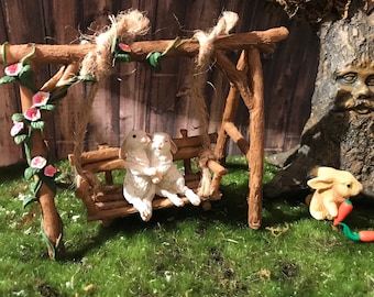 Love bunnies sitting on wood look swingset bunny rabbit holding hands miniature fairy garden bunnies love mini outdoor playground mini swing