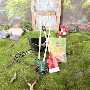 Eight piece red garden tools for fairy garden or doll house