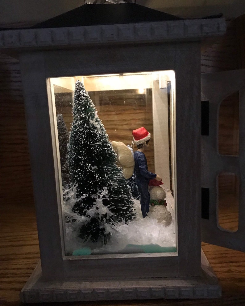 Sweet fairy boy with his dog out in the woods and winter snow scene in a french door lantern image 6