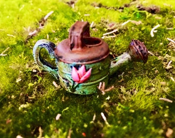 Adorable sweet fairy garden rustic watering can green with pretty pink flower
