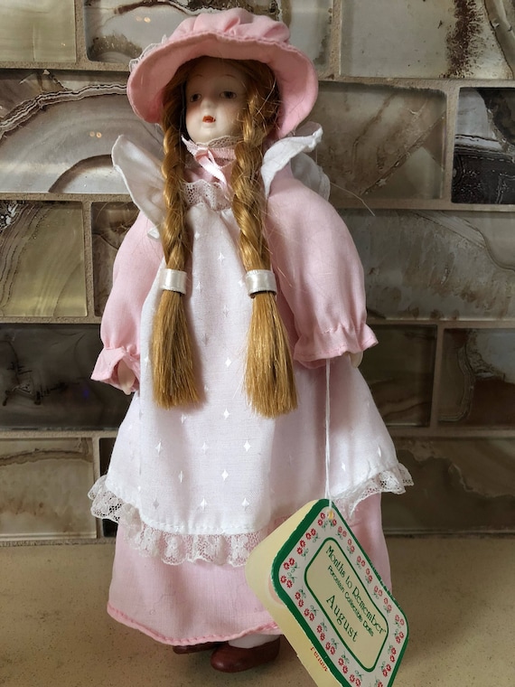 months to remember porcelain collectible dolls