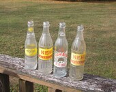 4 Vintage Soda Bottles Nu-Grape , NEWI, Atlanta, GA. Bedford, IN. Bowling Green, Ky.