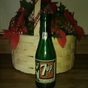 Vintage 7up bottle. 7 oz  8&quot; tall