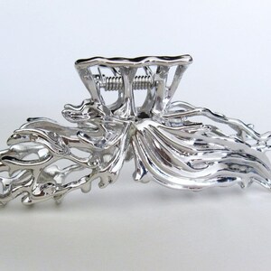 Large silver metal wavy hair claw clip for medium thick hair