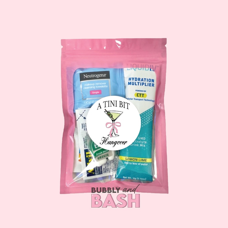 May include: A pink zippered pouch with the text "BUBBLY and BASH" printed on the front. The pouch contains a variety of items, including a small bottle of liquid IV hydration multiplier, a packet of electrolyte drink mix, a small tube of lemon lime powder, and a pack of makeup remover cleansing towelettes. A round sticker with a martini glass and the text "A TINI BIT Hungover" is on the front of the pouch.