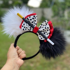 Cruella Disney ears.