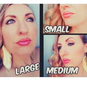 May include: Three pairs of gold feather earrings in different sizes: small, medium, and large. The earrings are shown on a model with blonde hair and makeup.
