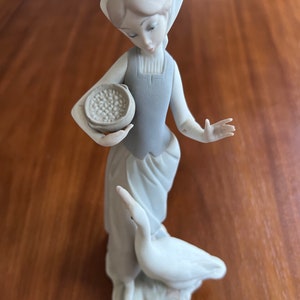 Lladro &quot;Girl Feeding Goose&quot;, #1052 Porcelain figurine