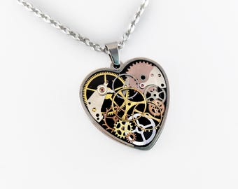 Steampunk style clockwork heart pendant