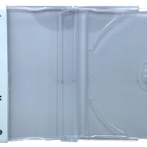 May include: A clear plastic CD case with a white label on the spine that says "odxmedia mediaxpo".