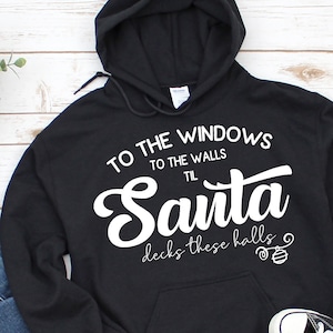 To the windows to the walls, til santa decks these halls, funny christmas shirt, deck the halls