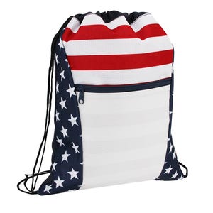 May include: Drawstring backpack with a patriotic design. The top features red and white stripes, while the sides display a navy blue background with white stars. A white section with white stripes and a navy blue zipper pocket complete the design.