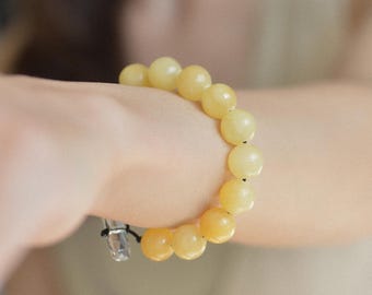 イエロージェイド10mm天然宝石ブレスレット • クリスタルトグルクラスプ