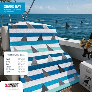 May include: A modern quilt pattern titled "Shark Bay" featuring a design of blue and white stripes with gray shark fin shapes. The quilt is displayed on a boat with sharks in the background. Finished sizes range from 32" x 38" to 76" x 90".