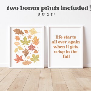 May include: Two 8.5 x 11 inch printable art prints. One print features a collection of colorful autumn leaves. The other print features the text "life starts all over again when it gets crisp in the fall".