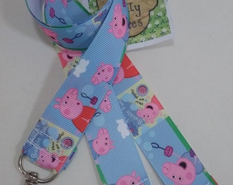 New Cute kid TV Cartoon Pig blue ribbon lanyard safety clip ID badge holder gift 