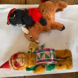 Three wind up toys