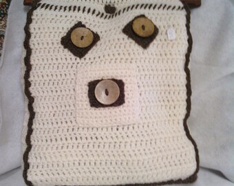 black and cream purse